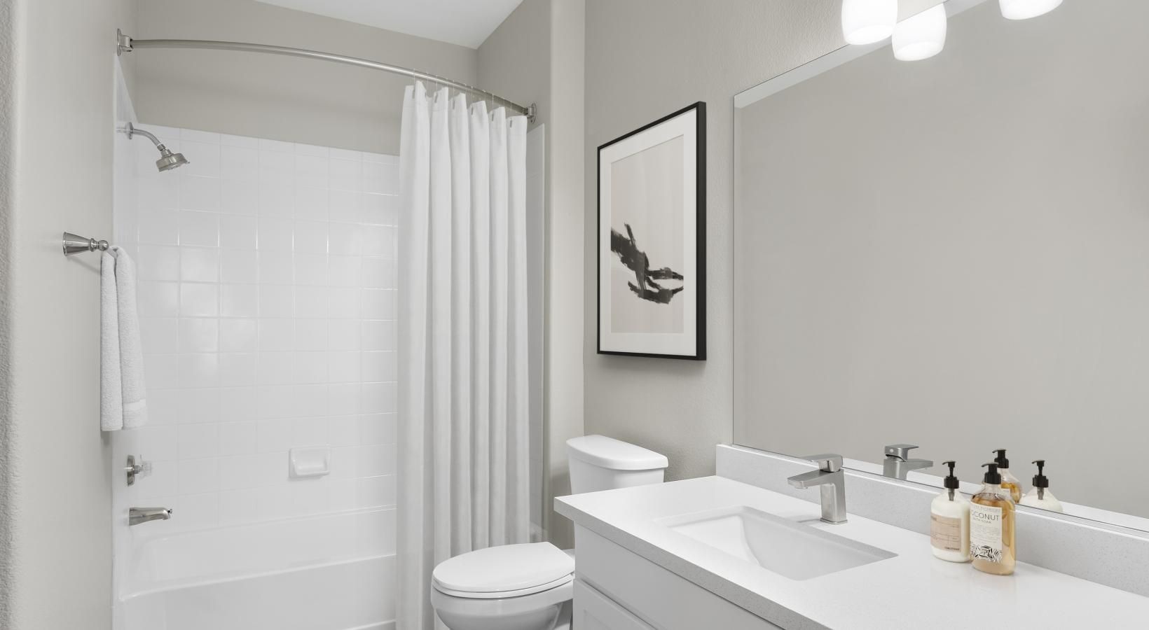 Spacious bathrooms with everything you need a bathroom with a shower and toilet